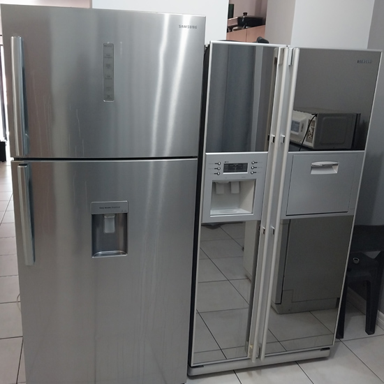 Refrigerator repair technicians